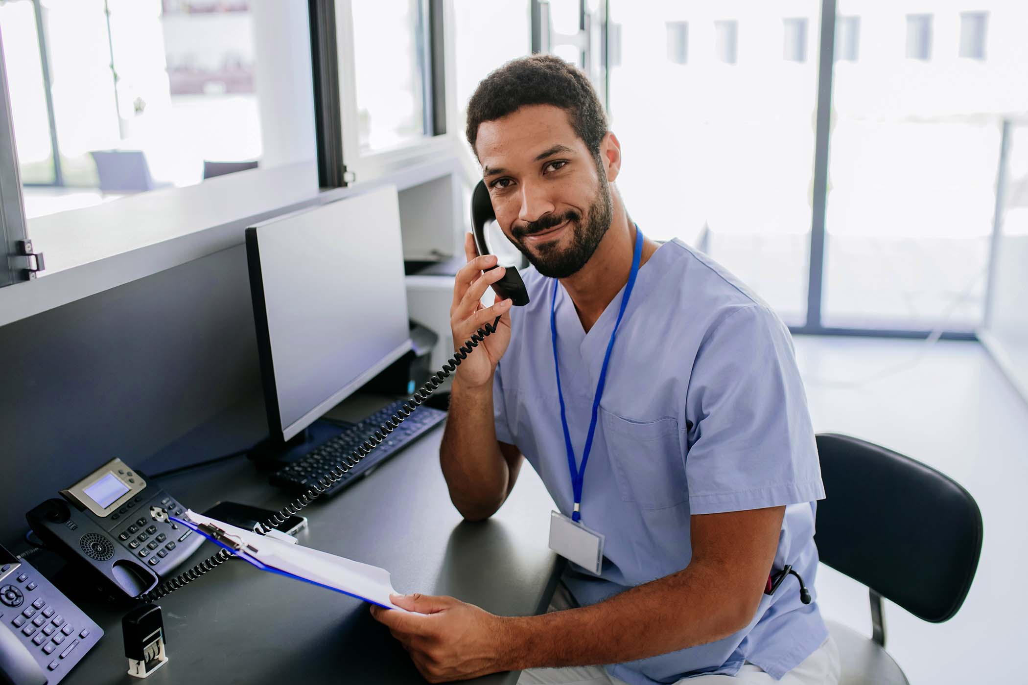 A WorkSafe USA team member taking an appointment call